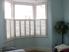 Cafe height shutters provide privacy and perceived security with 47mm louvres Archway