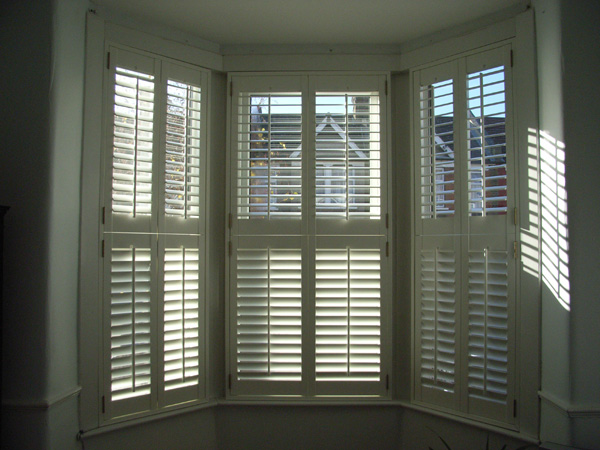 Tier on tier shutters with 63mm louvres 