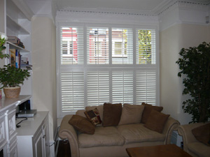 Tier on tier style shutters with 63mm louvres Highgate
