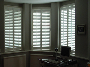 Full height shutters in this lower ground floor flat for privacy and perceived security Highgate