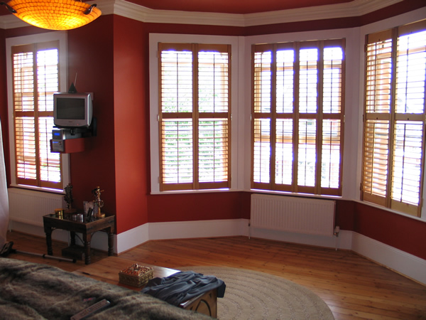 Oiled Western Red Cedar shutters with 63mm louvres.