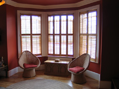 Oiled western red cedsr shutters fitted in muswell hill