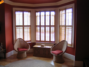 Oiled Western Red Cedar shutters with 63mm louvres Muswell Hill