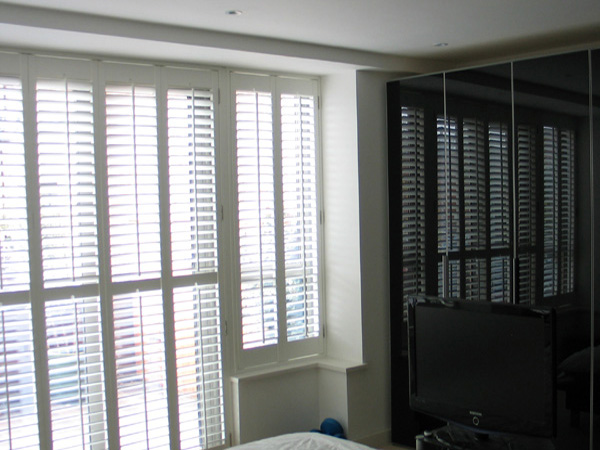 patio door shutters with reflection