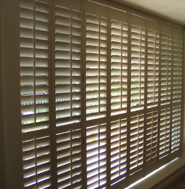 89mm louvres in lime white, hanging from tracking system