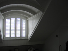 arched shutters with offset tilt rods Islington
