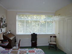 Three white 50mm slatted wood blinds Hampstead