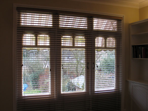 Three separate wood slat venetians