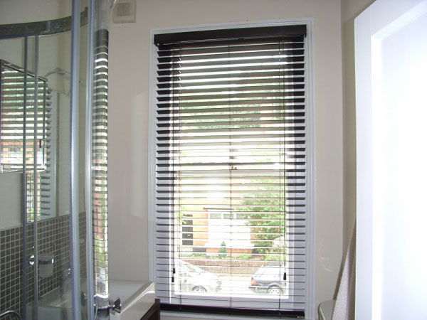 50mm hazel wood slat venetian blind fitted in a small bathroom in Highgate, North London