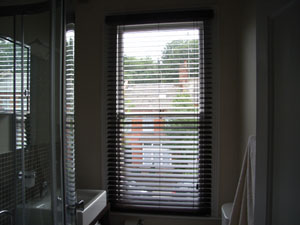 50mm hazel wood slat venetian blind fitted in a small bathroom in Highgate, North London