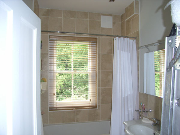 50mm Canadian Maple wood slat venetian fitted in a bath and shower area.