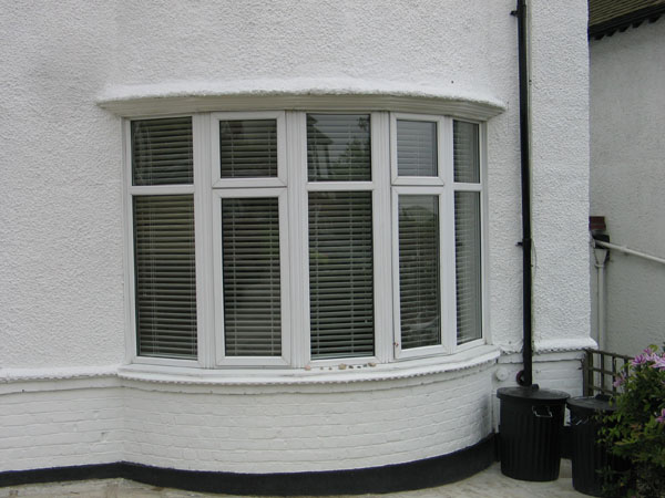 50mm white woodslats in bay window 